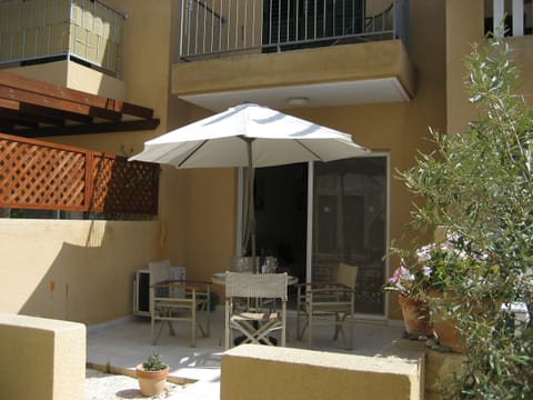Large patio area leading to pool
