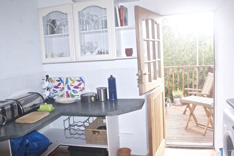 Sunny kitchen with terrace.