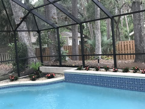 Screened in pool area.