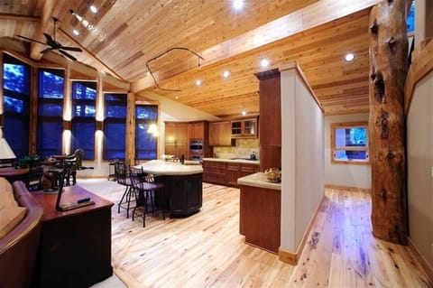 We brought the outside in with a hand hewn ceiling and log accents.