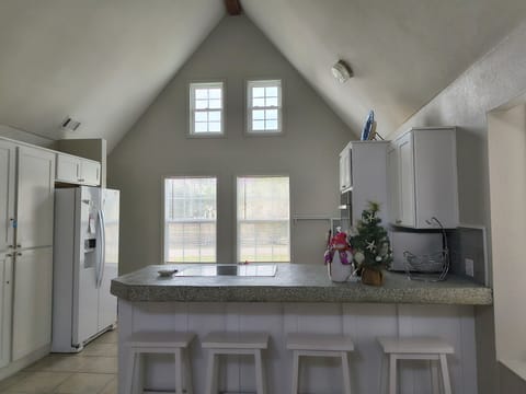 Living area to kitchen view.