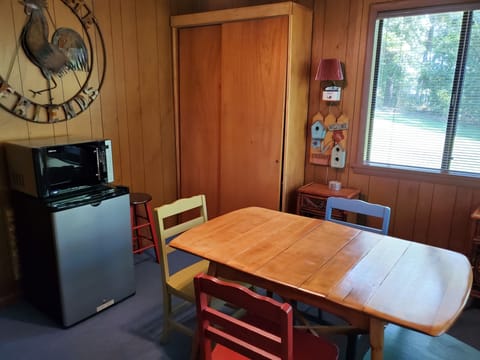 There is a kitchenette upstairs with another table for playing cards and games.