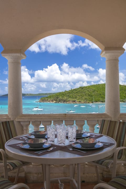 Outdoor dining on the balcony with that view!