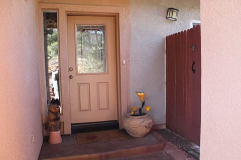 Your Entrance is the Gate to the Right of Front Door