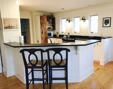 Open kitchen with breakfast bar