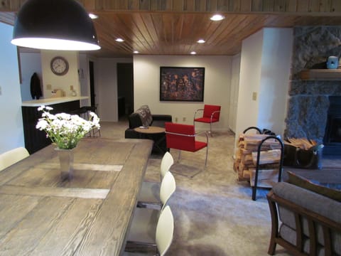 Rustic-modern decor; dining table for 8, TV area w/sleeper couch, breakfast bar