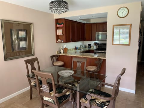 Comfortable dining area along with seating to keep the chef company.