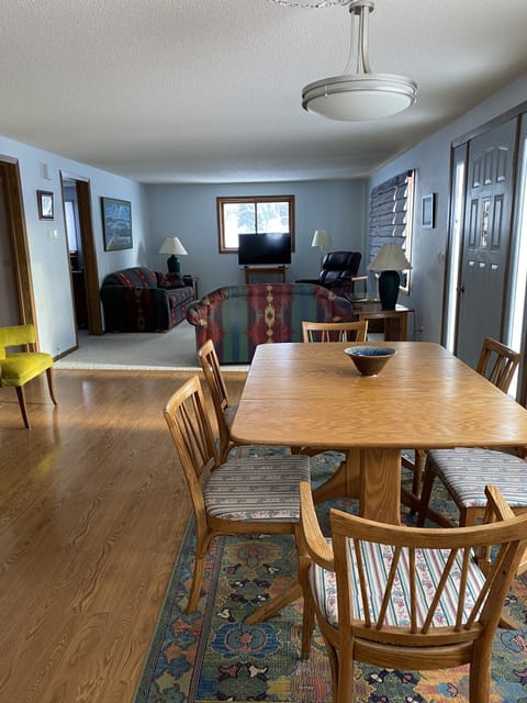 Large dining room table with additional leaves . Room for a family dinner.