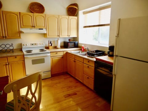 Kitchen looking east to sunrise over the bay.