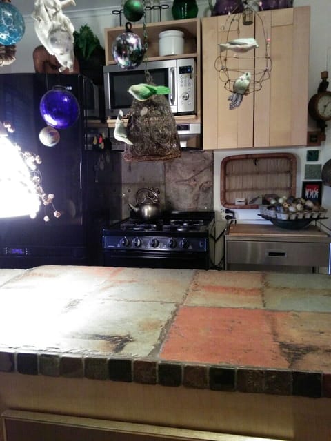 refrigerator, stove and mircowave overhead