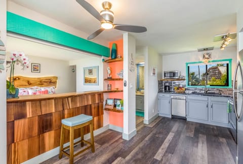 Hand crafted, Hawaiian hardwood countertop and shelving. 