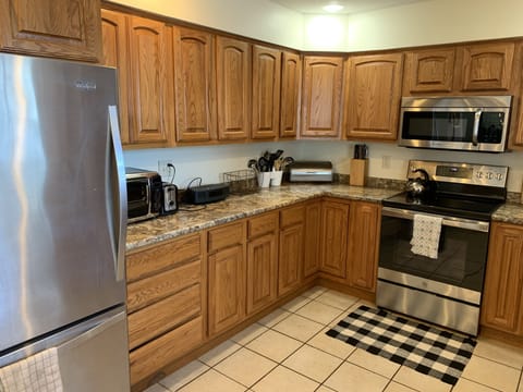 The kitchen is well stocked with all your cooking needs;  from pans to spices!