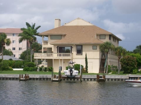 Rear view of the Cozy Cove complex from Blind Pass (the inlet) where fish jump.