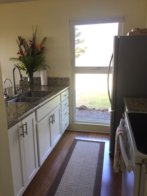 New kitchen, New kitchen window. Bright and tropical end unit