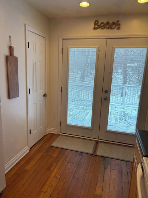 Kitchen French Doors Open to Back Deck and Yard