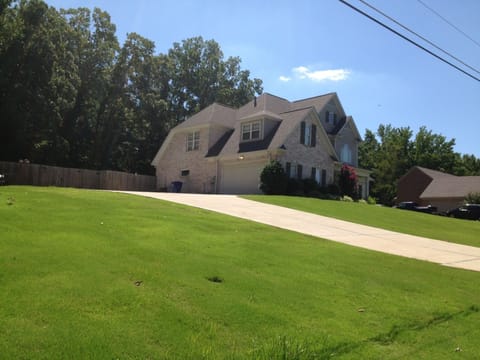 front side view of drive and garage