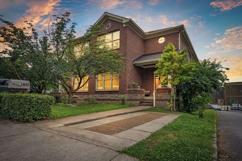 Front yard with one parking space.