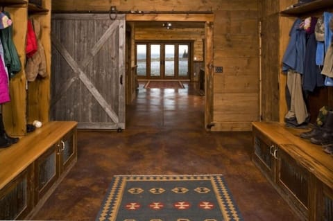 Mudroom and Game room (TV not visible) Ping pong & shuffleboard.