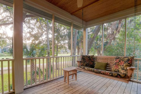 Relax and swing on the screened porch!