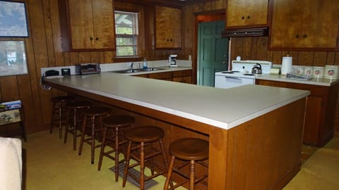 Kitchen counter seats an additional 6 people.