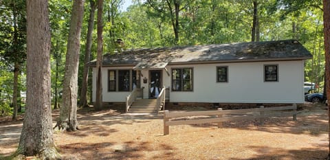 House is on a large wooded lot with a gorgeous view of Lake Murray!