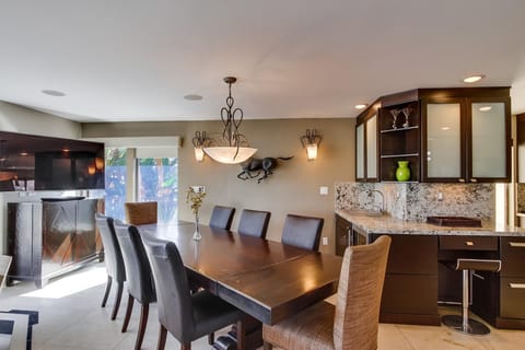 Large dining table flat-screen TV