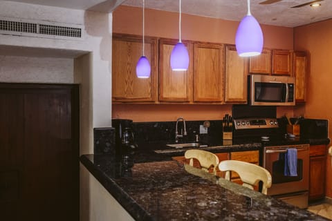 Modern Kitchen with Marble counter tops
