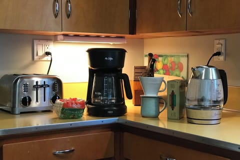 Coffeemaker and pour-over. Filters supplied. Electric kettle. Bring coffee & tea