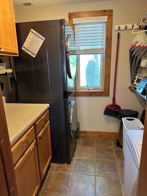 Travel light, an almost new stack washer and dryer is at your fingertips.