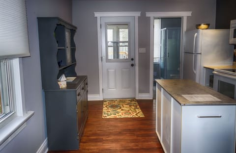 Mud room off kitchen to backyard. Three piece washrooms off kitchen