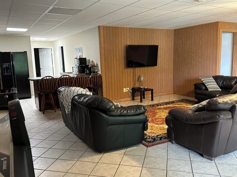 TVs on main level and lower level for multiple viewings in comfortable settings