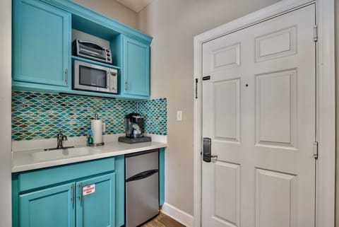 Cute kitchenette with mini fridge/freezer, Keurig, microwave, toaster oven