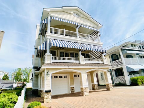 Front & Side of House. Awnings and ceiling fans make a cozy front deck