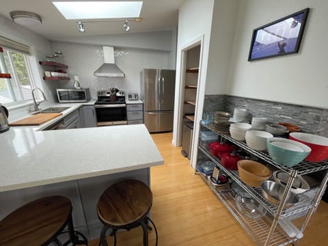 Kitchen utensils plates bowls, pots, pans & grill utensils. 