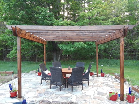 Stone Patio and Pergola with seating for 6. Enjoy!