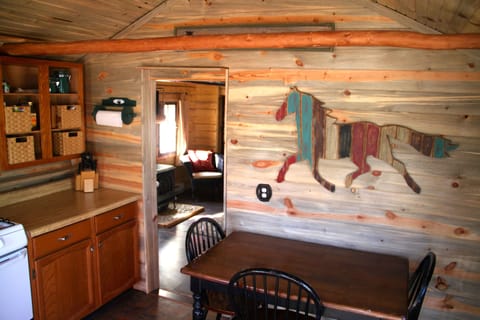 The kitchen redone with beetle-kill pine.
