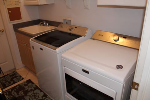  Washer and Dryer in a nice laundry room....storage for Beach Towels