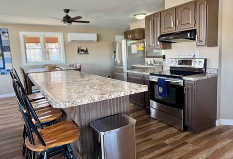 Kitchen, island, dining area
