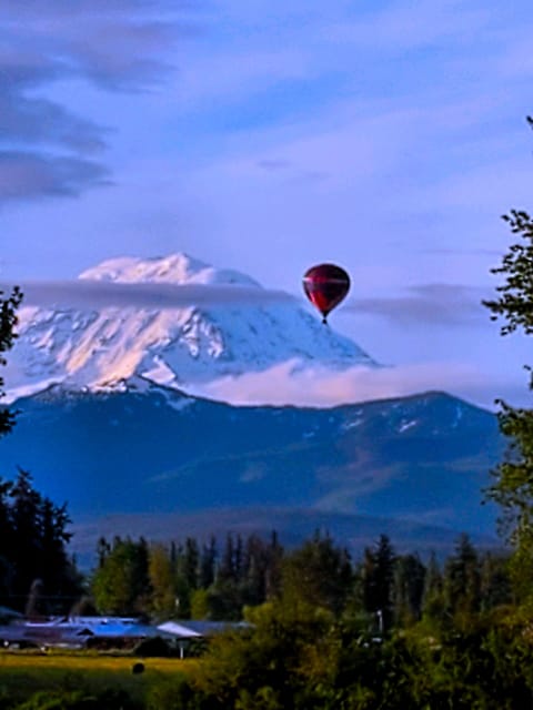 Early Morning Balloon over Enumclaw Plateau, Mt Rainier in the background. 