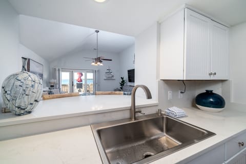 Pass through from the kitchen into the living area. Views of the ocean!