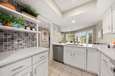 The kitchen is well stocked with everything you'll need for preparing meals.