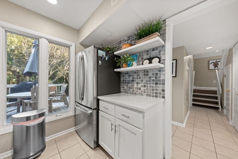 Stairs lead off the entry hall to the second floor.