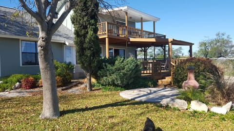 Back decks looking out onto lake. Perfect spot to have a glass of wine!
