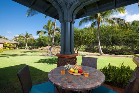 Covered Lanai with Outdoor Table and Chairs