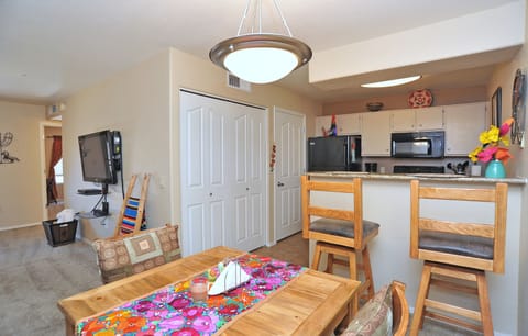 Kitchen has all the appliances needed.