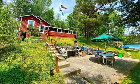 Main patio. Stone wood grill, charcoal and propane grill- chairs for 8.  