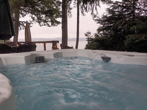 Enjoy the view from your private 5 person hot tub all year long.