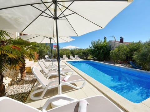 Water, Plant, Property, Building, Furniture, Swimming Pool, Shade, Outdoor Furniture, Tree, Umbrella