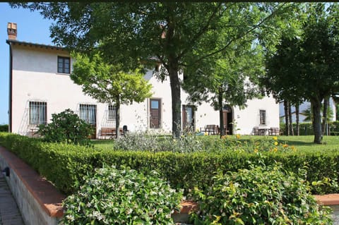 Just in front of the building there is a nice garden area with tables and chairs