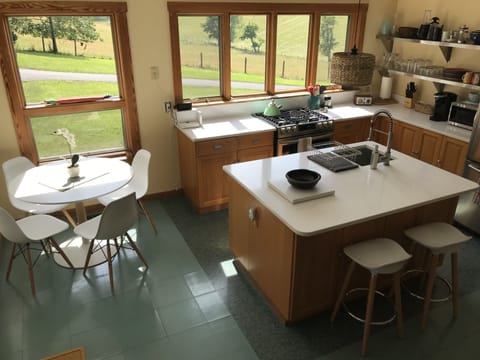 A sunny mod kitchen (fully stocked) with amazing views.